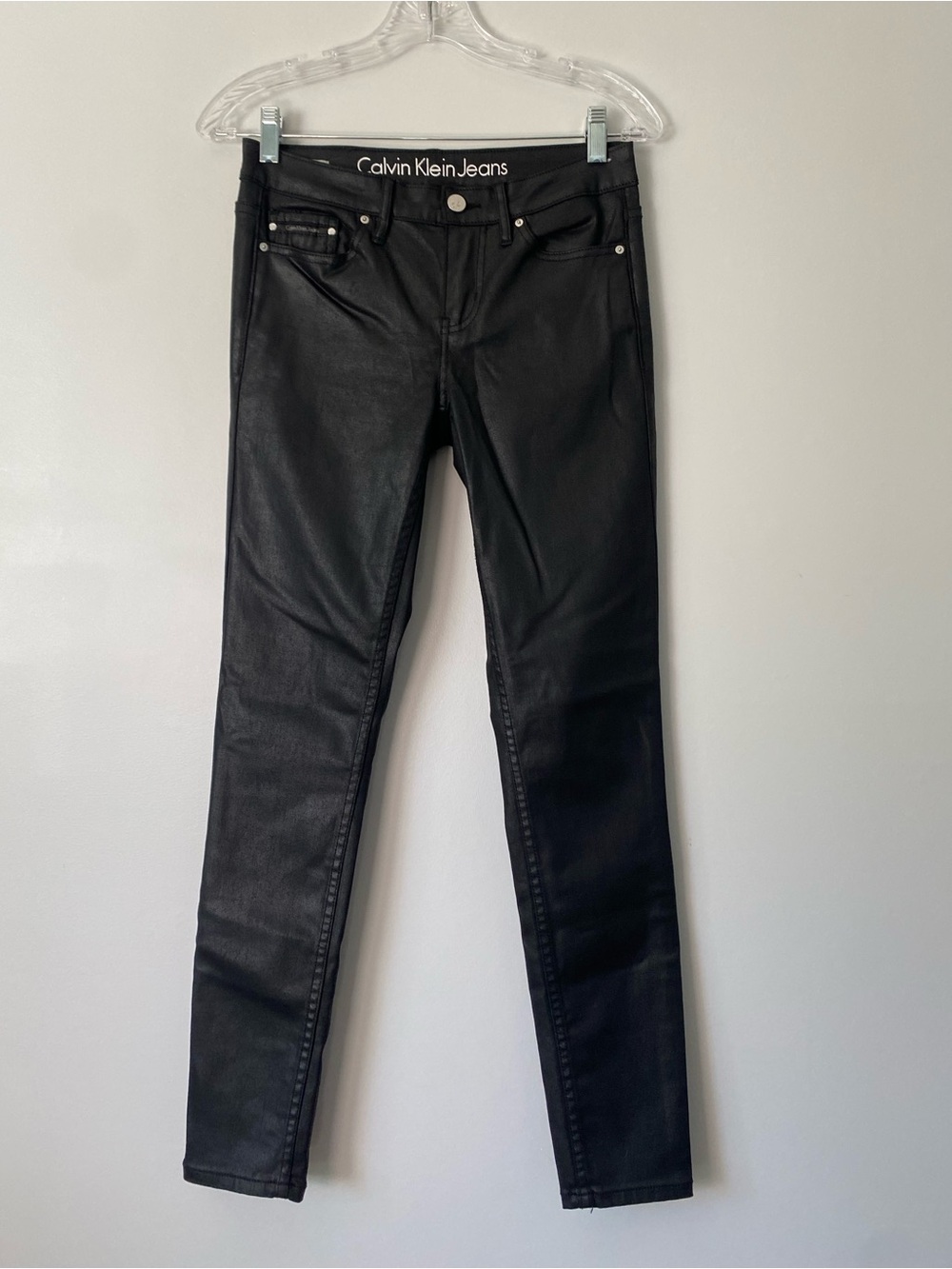 Calvin Klein Jeans black coated skinny jeans in size 27